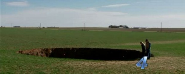 A massive sinkhole appears overnight at Beckham County near Sayre, Oklahoma. KFOR reports that the sinkhole is about 40 feet deep and 40 feet wide. Sinkholes are not so uncommon in western Oklahoma. Geologists at the Oklahoma Geological Survey say several things could have caused the sinkhole including salt or rock formations dissolving or a drought. They also say old coal mines are often full of water and when that water drains, there is no...